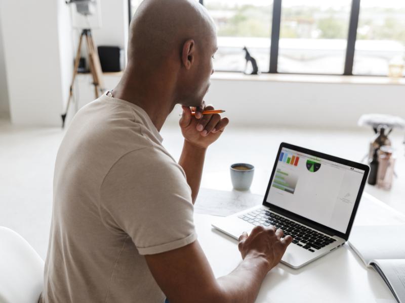 Man viewing a laptop